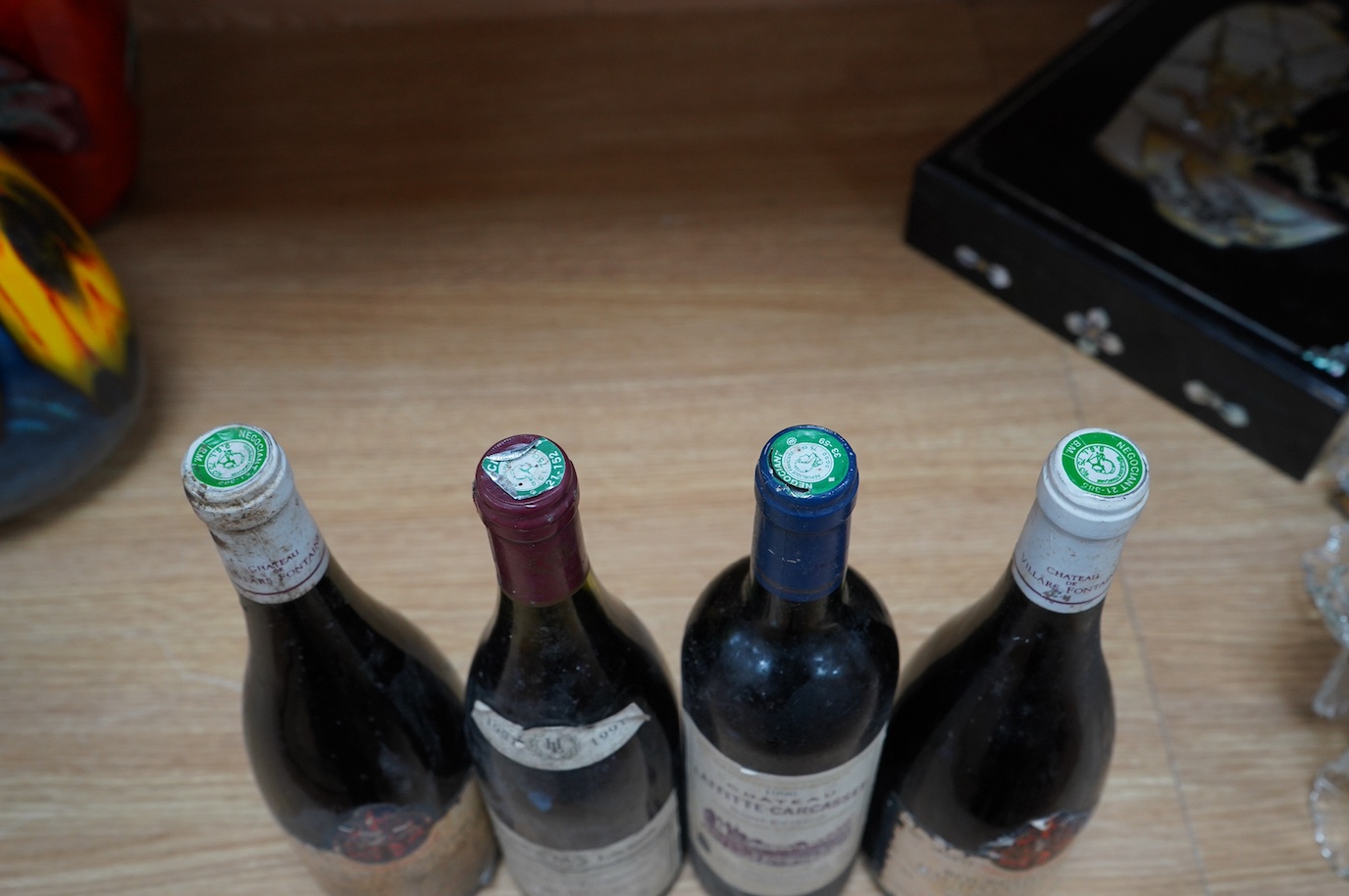 Three bottles of various Burgundy wine to include two bottles of Bourgogne 1990 together with a bottle of claret. Condition - fair, storage history unknown